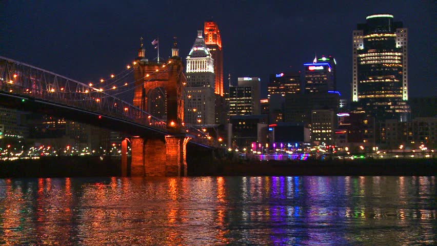 Light reflects off the Ohio River with the city of Cincinnati Ohio background.