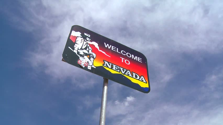 A sign welcomes visitors to Nevada.