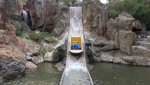 SALOU, SPAIN - SEPTEMBER 2012: Tutuki Splash Ride at Port Aventura. This theme park is visited by about 4 million visitors per year.