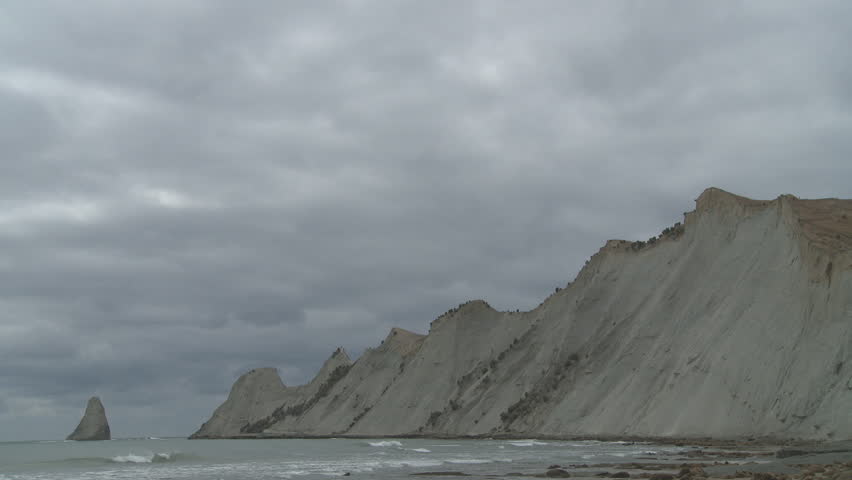 Cape Kidnappers and beach. The Cape is home to a large gannet colony. Time lapse