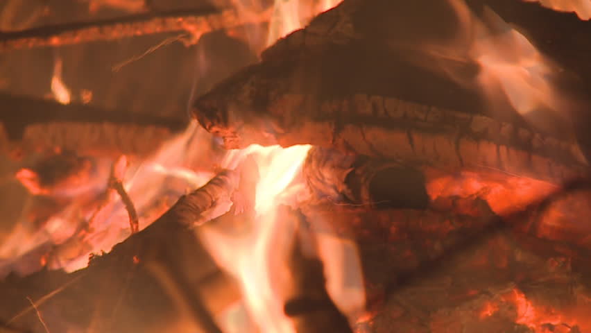flames, smoke and embers in a hot wood fire