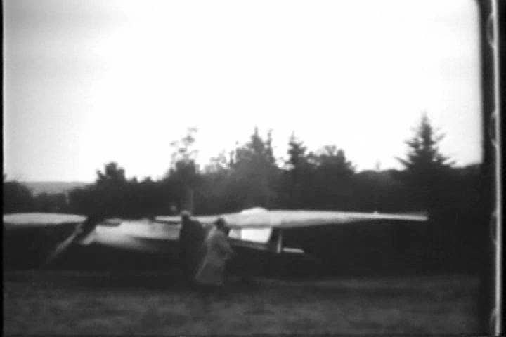 1920s - A strange bird like airplane flaps its wings before crashing in 1929. Royalty-Free Stock Footage #4847150