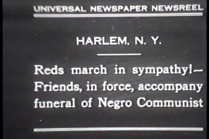 1930s - Communists march in Harlem in 1930.