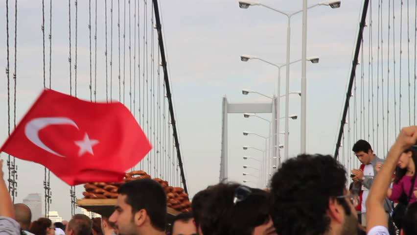ISTANBUL - OCT 17: Bosphorus bridge seriously vibrates while people run all