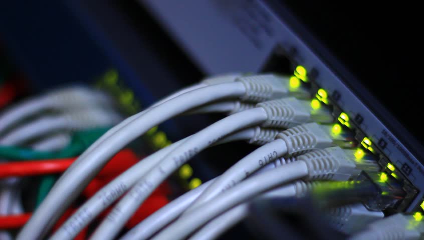 Router routing data over Ethernet in the company data center. Royalty-Free Stock Footage #4850753
