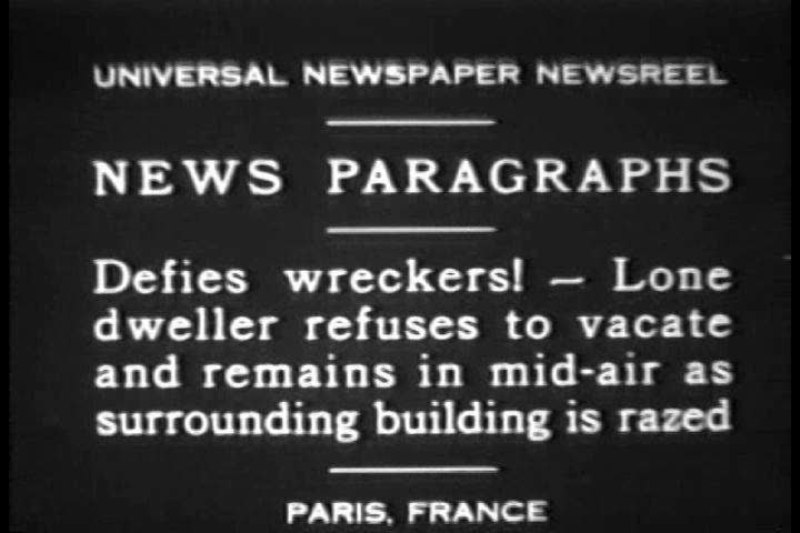 1930s - Man refuses to move out of Paris building in 1930 as it is torn down.