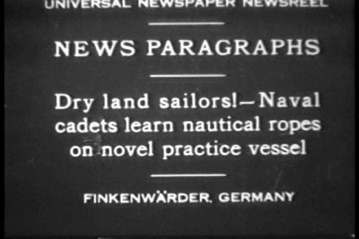 1930s - Navy cadets practice seamanship on a fake wooden vessel on dry land in 1930.