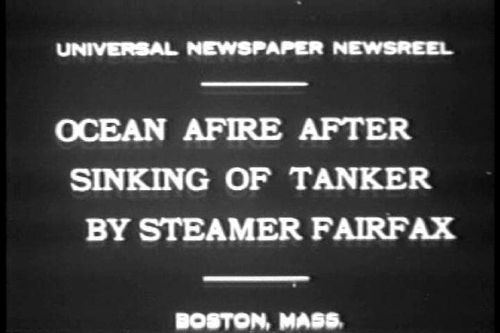 1930s - The steamer Fairfax sinks in the harbor and burning oil is set afire on the water in 1930.