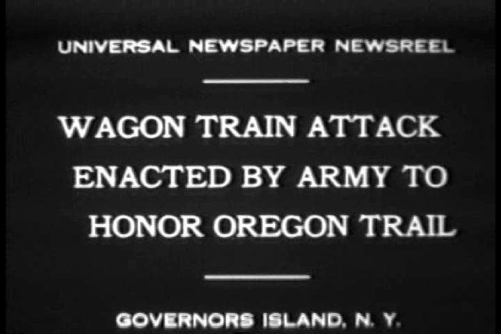 1930s - A reenactment of a wagon train attack on the Oregon Trail in 1930.