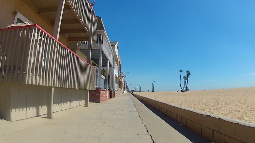 SEAL BEACH, CA: October 12, 2013- The camera is on the sidewalk rolling past