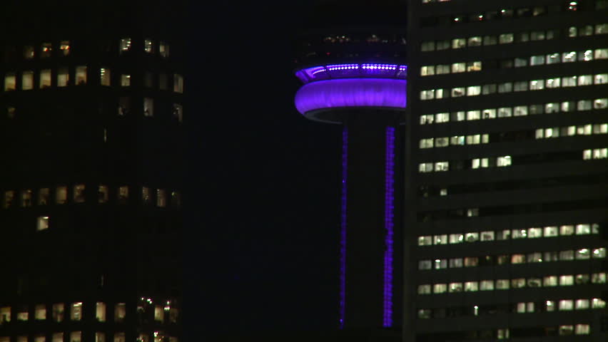 City of Toronto, Ontario, Canada, at night.  Shot starts close and zooms out to