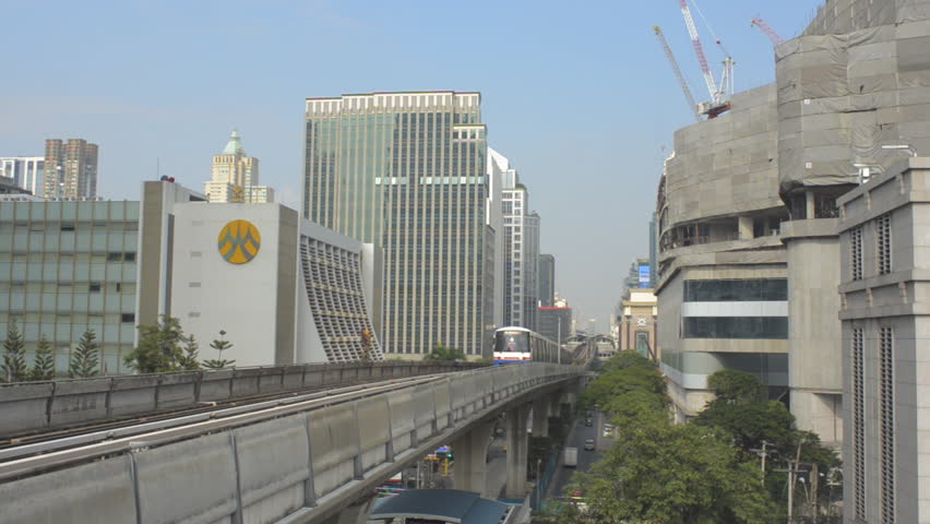 BANGKOK, THAILAND - OCTOBER 9 2013: The BTS skytrain running past skyscrapers