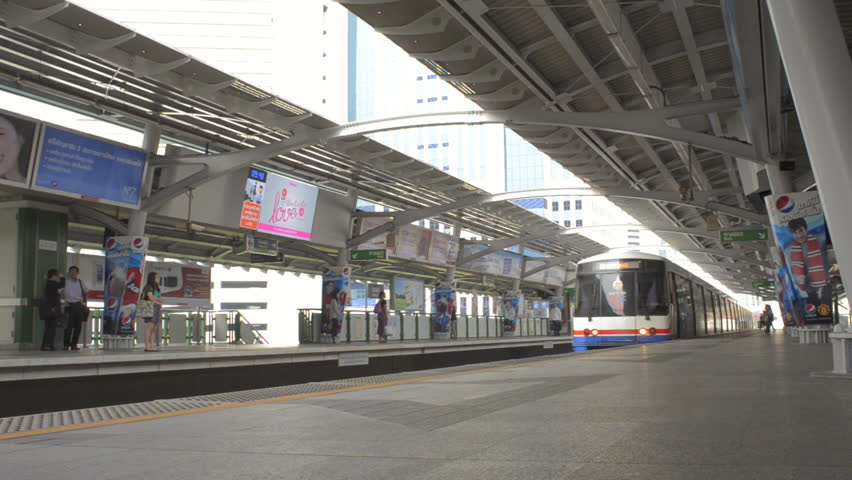 BANGKOK, THAILAND - OCTOBER 9 2013: A train arriving at a skytrain station in