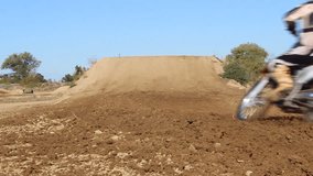 Big Air  Motocross jump  supercross moto-x freestyle rider racer on Dirt bike motorbike track in slow motion HD High Definition stock video footage clip 1080