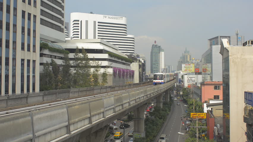 BANGKOK, THAILAND - OCTOBER 9 2013: The BTS skytrain running past skyscrapers
