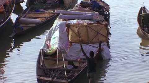 MALI-CIRCA 2012-Boats are loaded along the Niger River in mali, Africa.