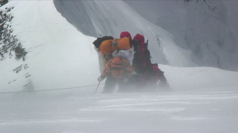 Climbers battered by strong winds