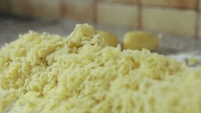 Close up of preparing potatoes for gnocchi, an Italian specialty. High definition video.
