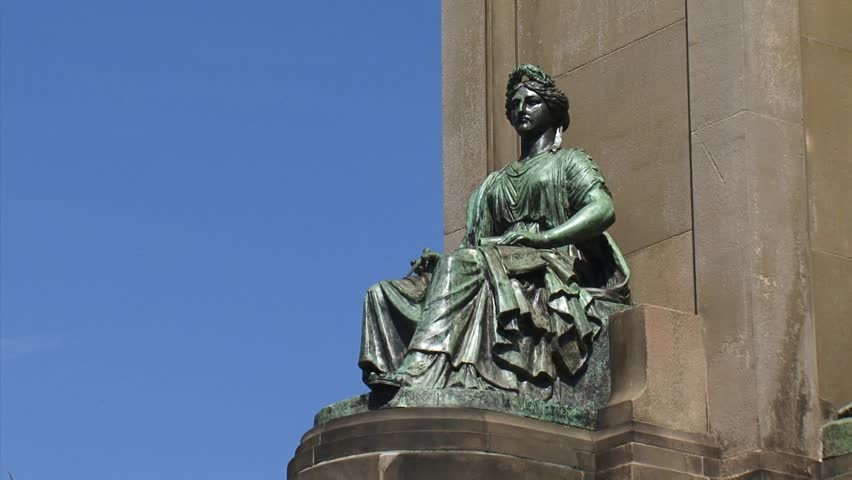THE HAGUE, THE NETHERLANDS - July 2013: Monument of Independence at Plein 1813, female figure representing history + zoom out statue King Willem I taking the oath of the constitution.