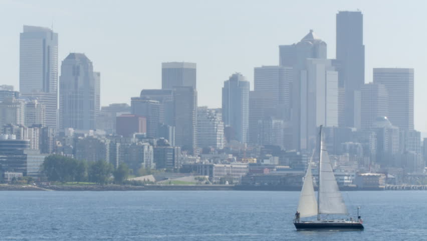 Sail boat passing in front of the Seattle skyline, Washington.