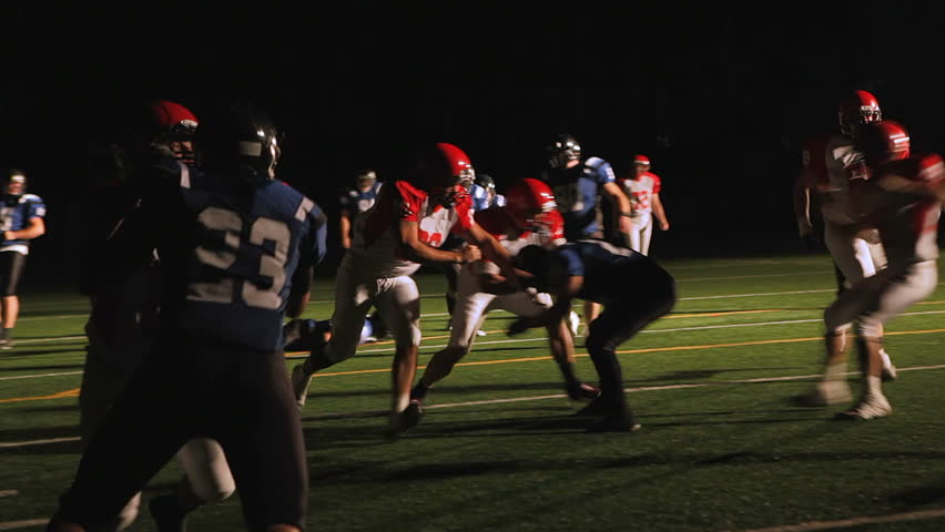 wide shot football player running down Stock Footage Video (100% ...