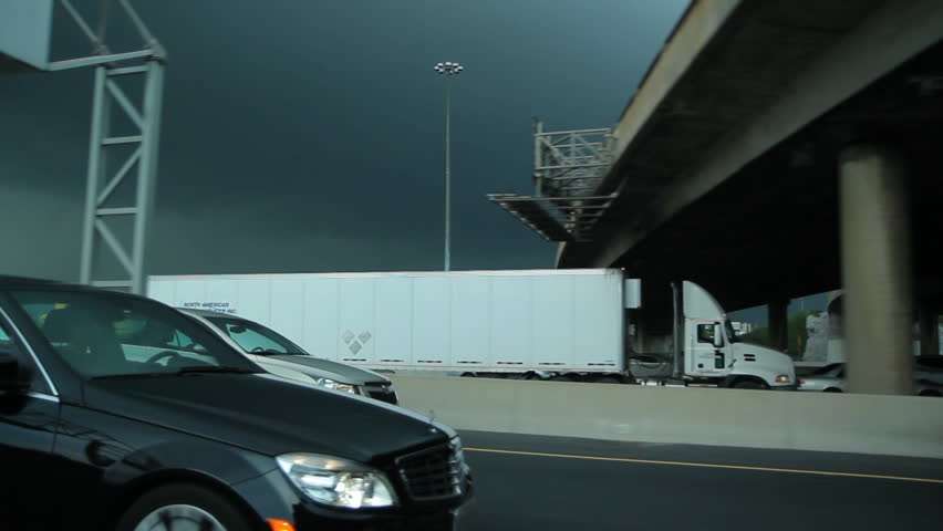 TORONTO, CANADA on  MAY 21st:  Approaching storm on the 401 Highway in Toronto, Canada on May 21, 2013. The segment of Highway 401 passing through Toronto is the busiest highway in North America.