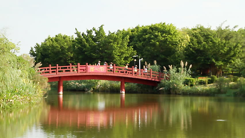 Red Wooden Arch Bridge