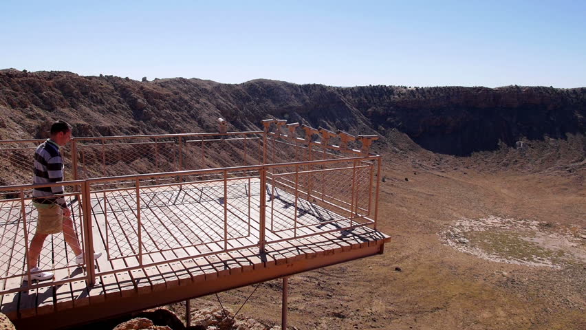 A man visits Meteor Crater in northern Arizona.