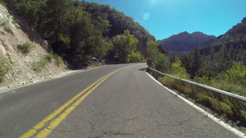 Driver's perspective of driving on route 89 into Sedona, Arizona.