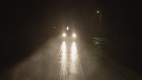 Outdoor driving shot on a rainy night. Full 1080p HD Video! POV.