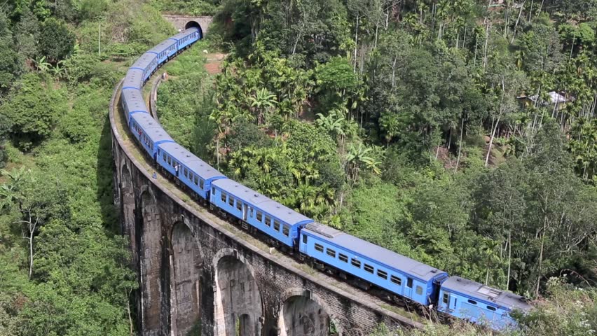 train crossing bridge entering tunnel sri Stock Footage Video (100% ...