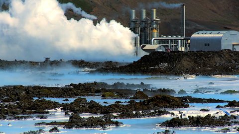 Steam from geothermal energy being piped from natural volcanic hot springs 