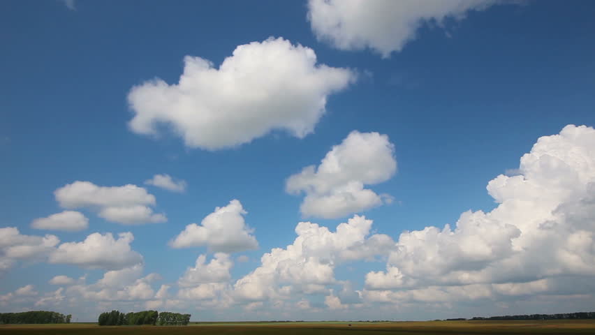 timelapse with clouds moving over field