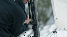 Sailor disassemble the main sail of sailboat - Powered by Shutterstock - Get 15% off with code: PIKWIZARD15