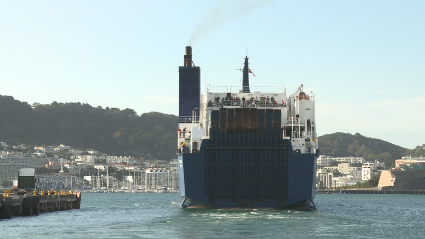 A vehicle ferry leaving Port