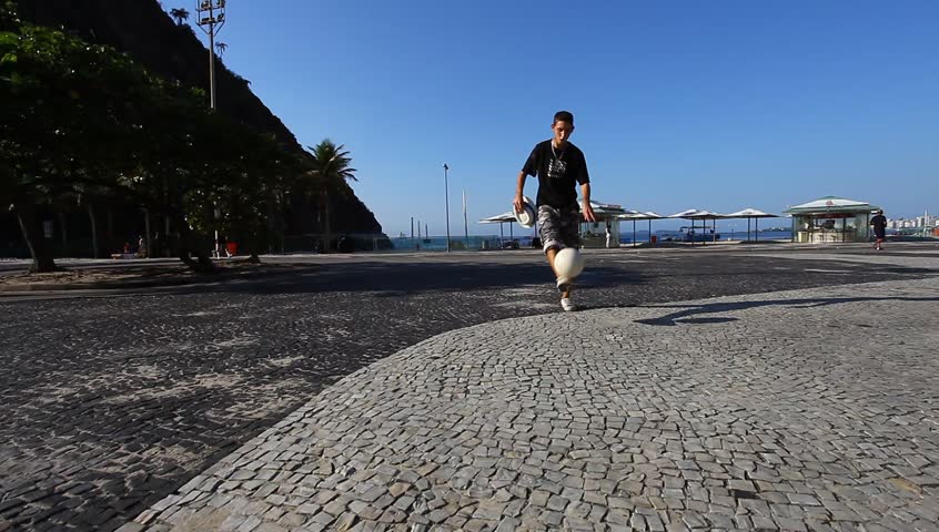Rio de Janeiro, BRAZIL - 20 October 2013: Juggling with soccer ball