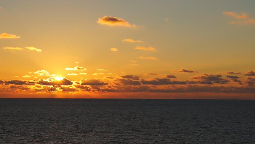 Ocean sunrise from moving boat.
