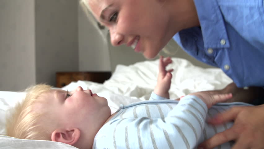 Mother Kissing And Shaking Adorable Stock Footage Video