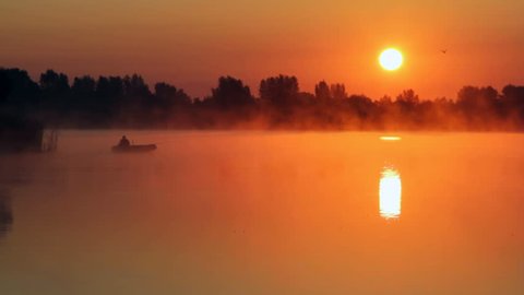 sunrise on the lake, sunrise over river, Fisherman on the boat on the sunrise, morning Landscape, morning fishing