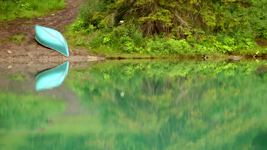Lone Canoe on the shore of Emerald Lake in Yoho National Park