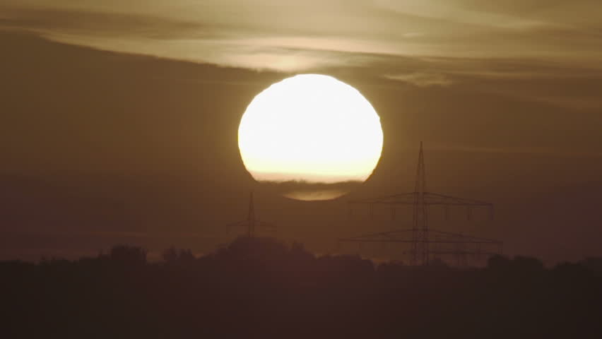 Sunset on an electricity pole