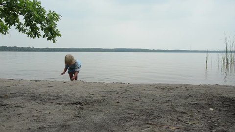 Little Girl Playing On Lake Stock Footage Video (100% Royalty-free ...