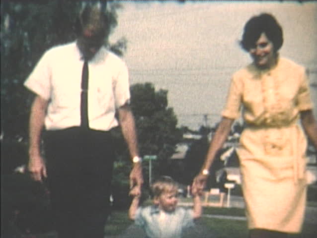 1960s home video footage of toddler son walking with dad, Seattle, Washington.