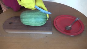 cut of fresh green zucchini in kitchen on table