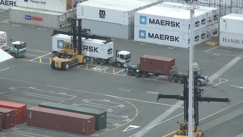 NAPIER,NEW ZEALAND-MAY 2013: Time lapse of trucks being unloaded of their cargo