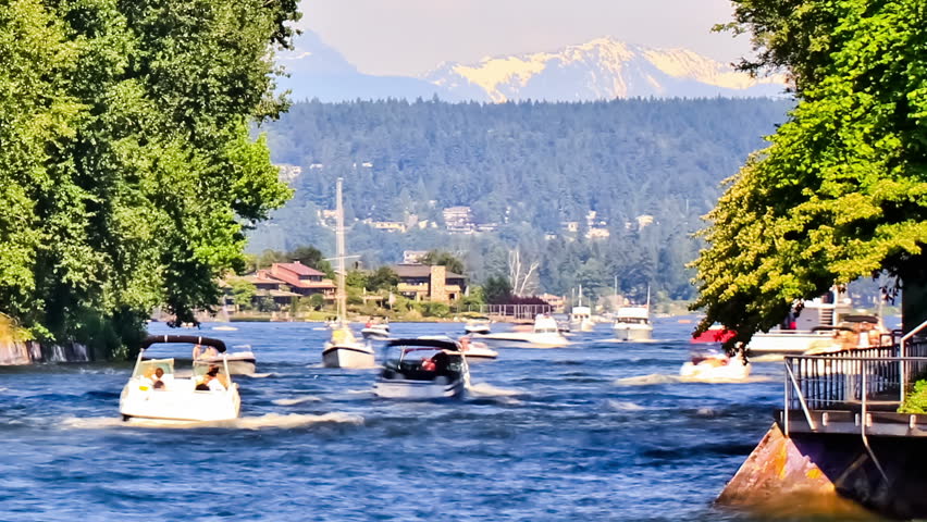 Zooming boat traffic time lapse passing by.