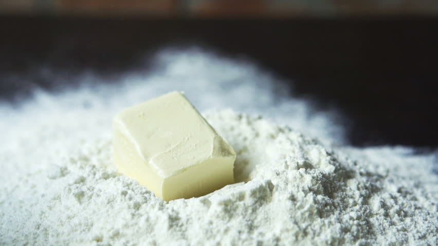 butter throwing into heap of flour, slow motion at 240 fps
 Royalty-Free Stock Footage #4946399