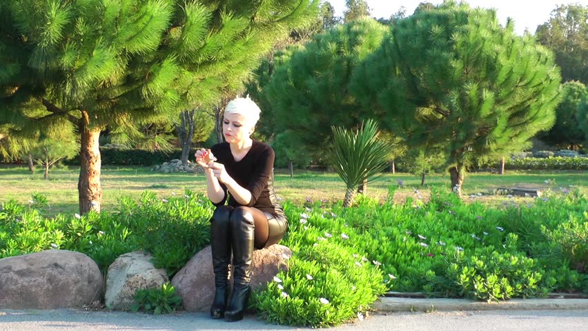 Woman in the Park holding Flower