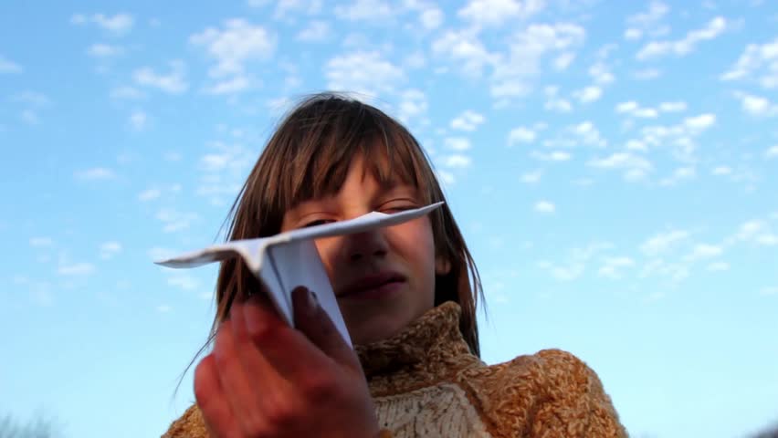 boy with paper airplane(close-up)