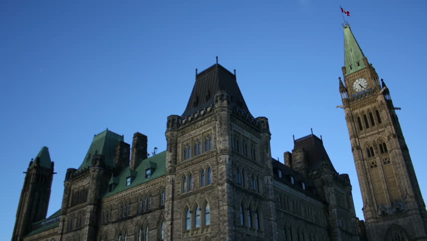 Parliament Hill Ottawa Time Lapse 2. Late afternoon time lapse shot of the Centre Block building, on Parliament Hill in Ottawa Canada. Unique perspective.